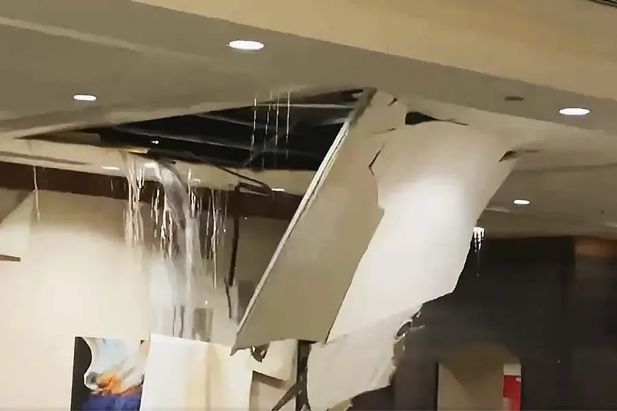 Water spreading from a burst supply pipe inside a home